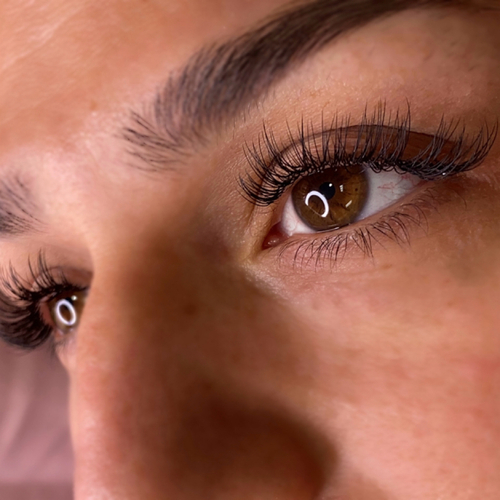 A photo of a woman with classic lash extensions.
